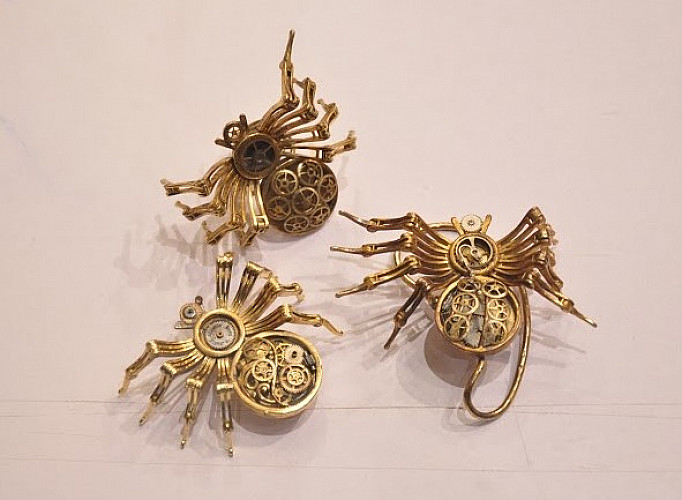 Spider brooch, ring, and ear cuff retailed at Tanieya Khanuja